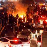 Republicans light cigars, cigarettes on burning photos of Khamenei to show support for Iranian protesters