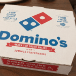 Domino’s stock falls as sales miss signals consumer strain